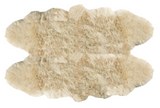Black Quarto Longwool Sheepskin Rug by Auskin featuring soft, plush black sheepskin with long wool fibers.