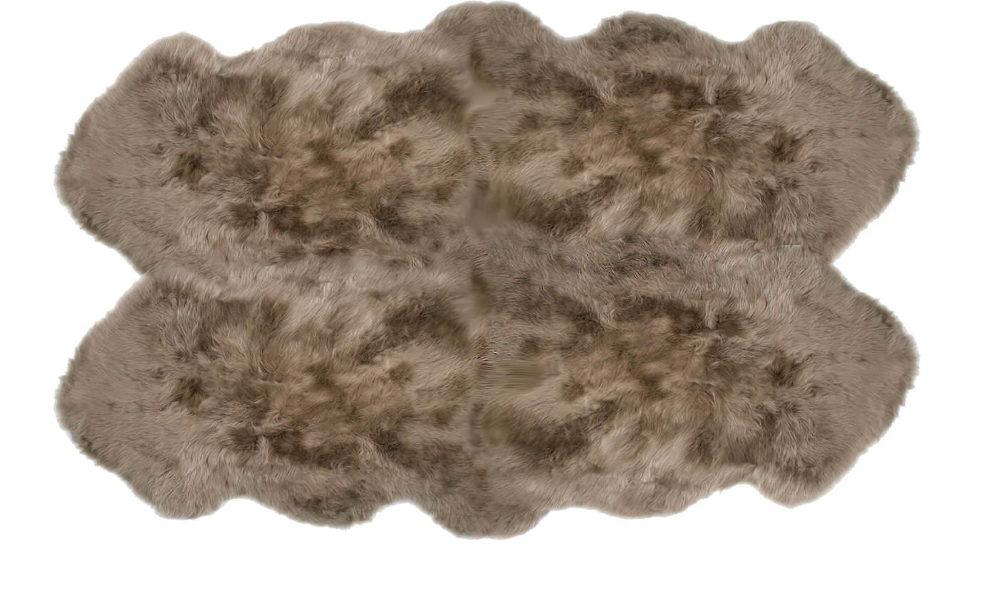 Black Quarto Longwool Sheepskin Rug by Auskin featuring soft, plush black sheepskin with natural long wool texture.