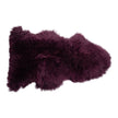 Dark orchid Auskin single longwool sheepskin with soft, plush texture and natural wool fibers, ideal for comfort and decor.