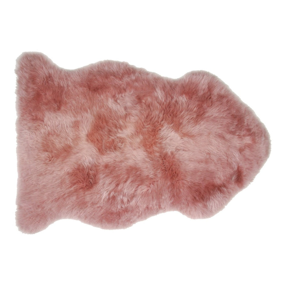 Dark orchid Auskin single longwool sheepskin showing soft, plush wool fibers and smooth leather backing.