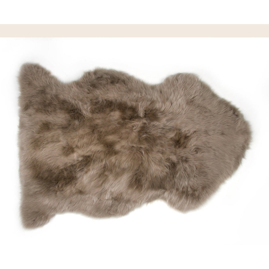 Dark orchid single longwool sheepskin from Auskin, showcasing soft, plush sheepskin with long wool fibers.