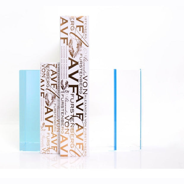 AVF Home Chapter Bookends in lagoon color holding books on a shelf, sturdy metal design for organizing books.