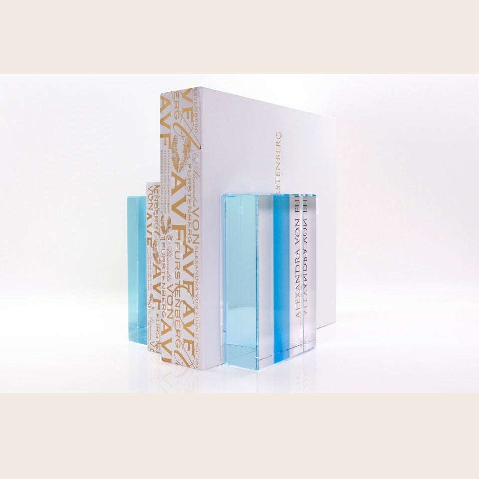 AVF Home Chapter Bookends in lagoon color, stylish metal bookends holding books upright on a shelf.