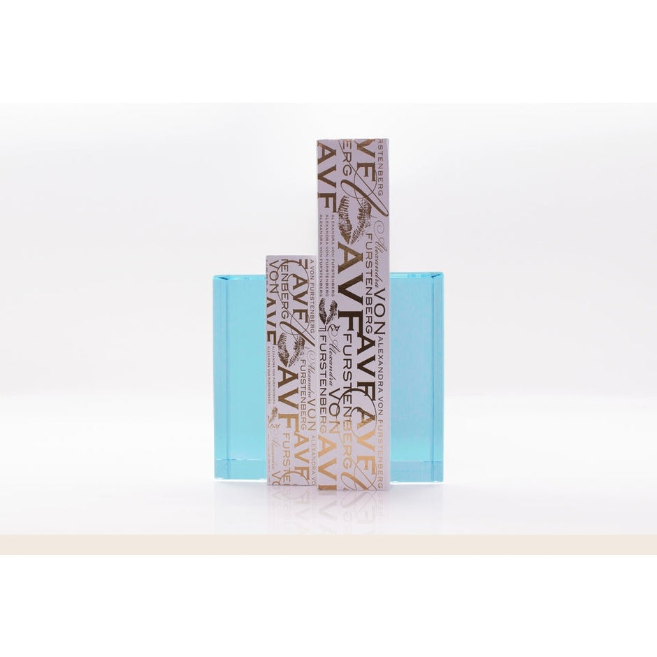 AVF Home Chapter Bookends in lagoon color holding books on a shelf, stylish metal bookends for organized book display.