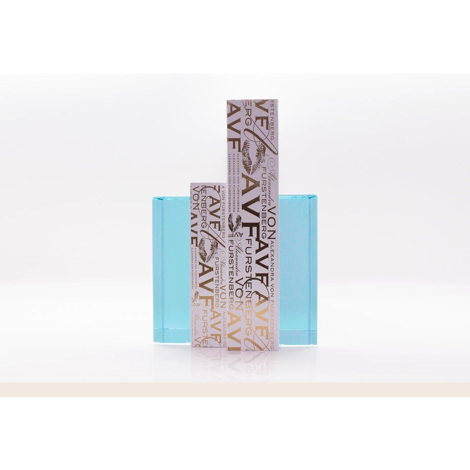 AVF Home Chapter Bookends in lagoon color holding books on a shelf, stylish metal bookends for organized book display.