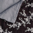 Bella Notte Lynette throw blanket in Tahoe Blue, soft and cozy fabric with a luxurious drape.
