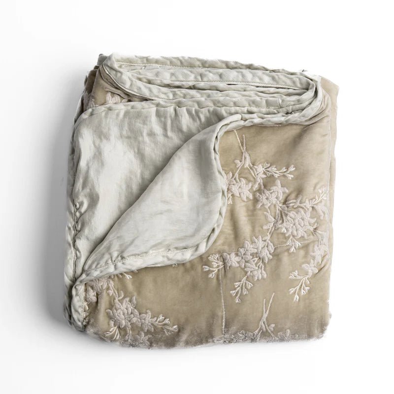 Bella Notte Lynette throw blanket in Tahoe Blue, soft and cozy fabric with a luxurious texture, shown draped for comfort.