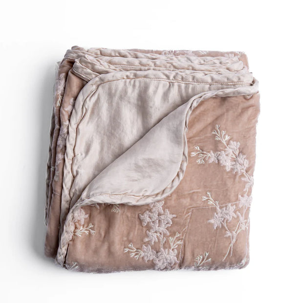 Bella Notte Lynette Throw Blanket in Tahoe Blue, soft and cozy fabric, displayed folded with a textured surface.