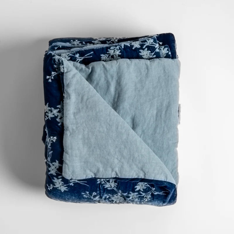 Bella Notte Lynette throw blanket in Tahoe Blue, soft and cozy fabric perfect for adding warmth and style to your space.