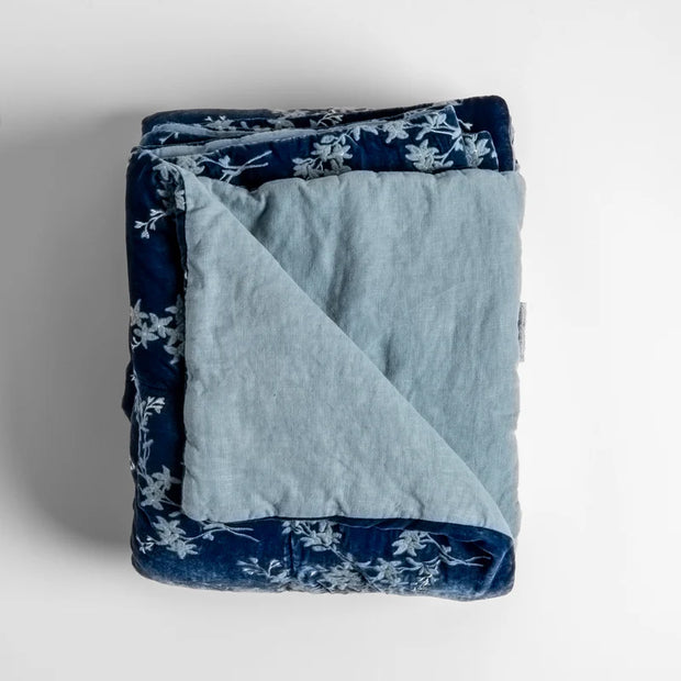 Bella Notte Lynette Throw Blanket in Tahoe Blue, soft and cozy fabric, displayed folded with detailed stitching and plush texture.