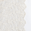 Bella Notte Allora bed skirt in natural fabric, featuring a flat, elegant design for a sophisticated bedroom look.