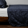 Bella Notte Marisette bedspread in cloud color, king size, featuring soft, luxurious fabric with elegant drape.