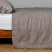 White Bella Notte Ines Bedspread on a king-size bed, showcasing soft, luxurious fabric with elegant stitching details.