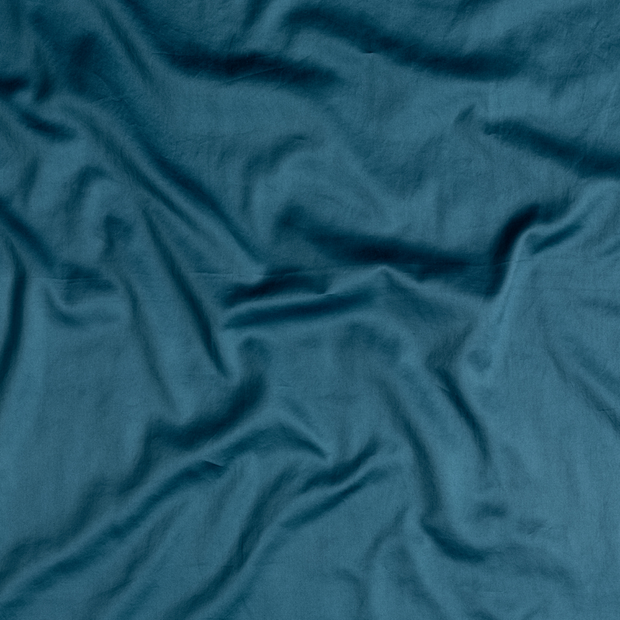 Bella Notte Bria Duvet Cover in Cenote fabric, showing soft, luxurious bedding with intricate pattern and elegant design.