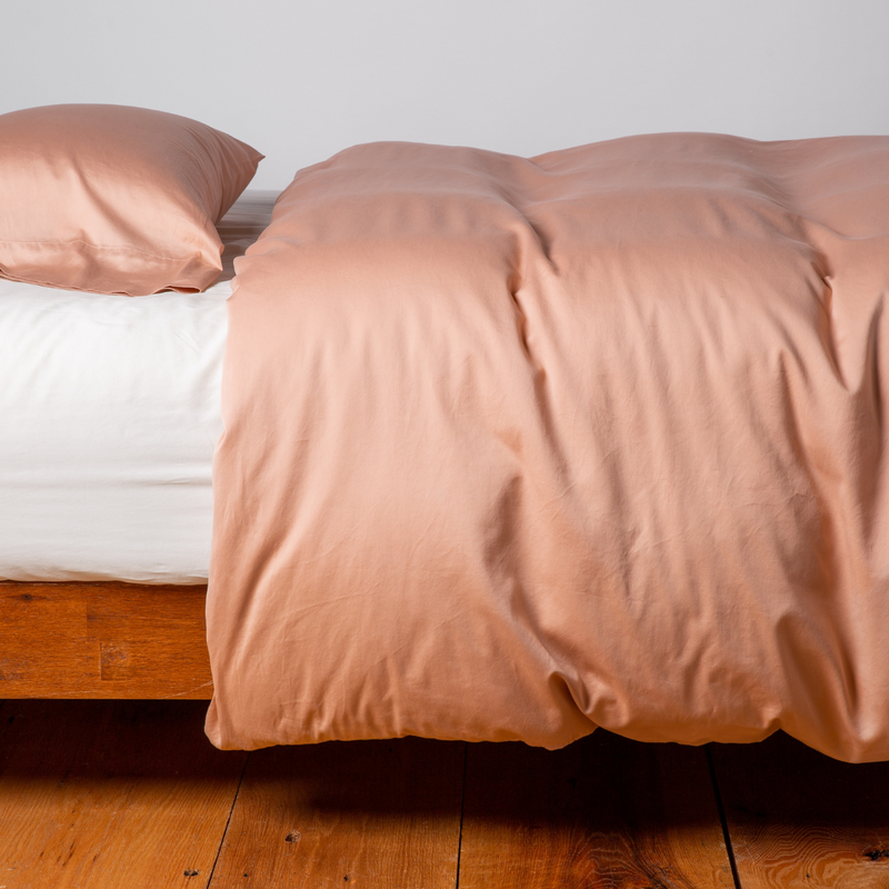 Bella Notte Bria Duvet Cover in Cenote, king size, showcasing soft, luxurious fabric with elegant design and stitching details.