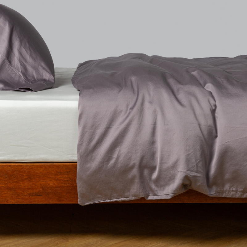 Bella Notte Bria Duvet Cover in Cenote, king size, soft fabric with elegant design, displayed on a bed.