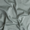 Bella Notte Bria duvet cover in Cenote fabric displayed on a bed, showcasing its soft, luxurious texture and elegant design.