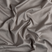 Bella Notte Bria duvet cover in Cenote fabric, showcasing elegant, soft-textured bedding with intricate detailing.