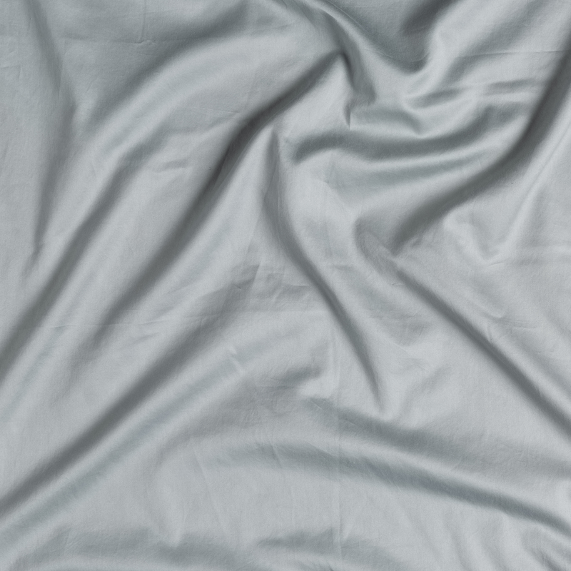 Bella Notte Bria duvet cover in elegant Cenote fabric, showcasing soft, luxurious bedding with intricate details and refined craftsmanship.