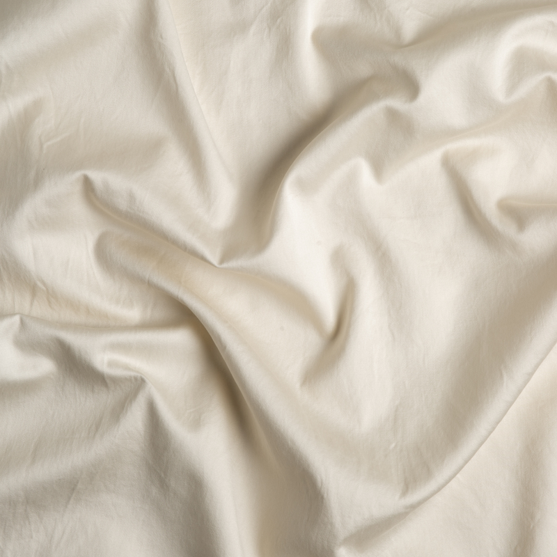 Bella Notte Bria Duvet Cover in Cenote fabric, showcasing soft, luxurious bedding with elegant natural texture.