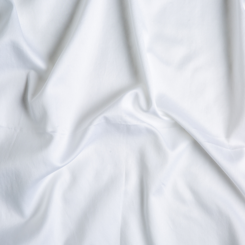 Bella Notte Bria duvet cover in elegant fabric with a soft, textured design, shown in a rich, neutral color for a luxurious bedroom look.