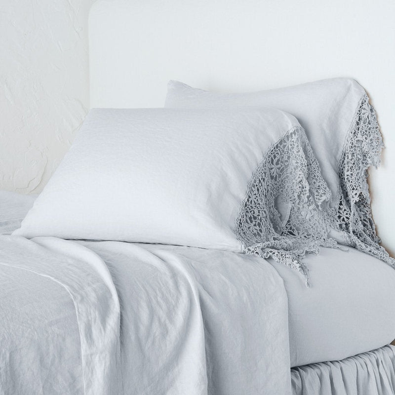 King-sized linen pillowcase with Frida lace detail by Bella Notte, showing soft fabric and intricate lace trim.