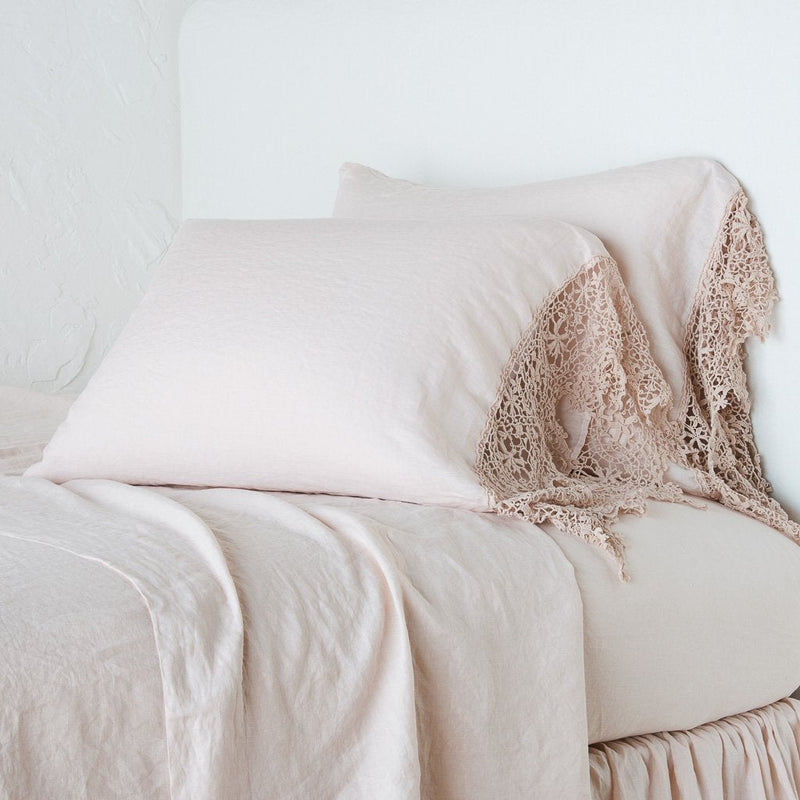 King-sized linen pillowcase with Frida lace detailing by Bella Notte, featuring soft, elegant fabric and intricate lace accents.