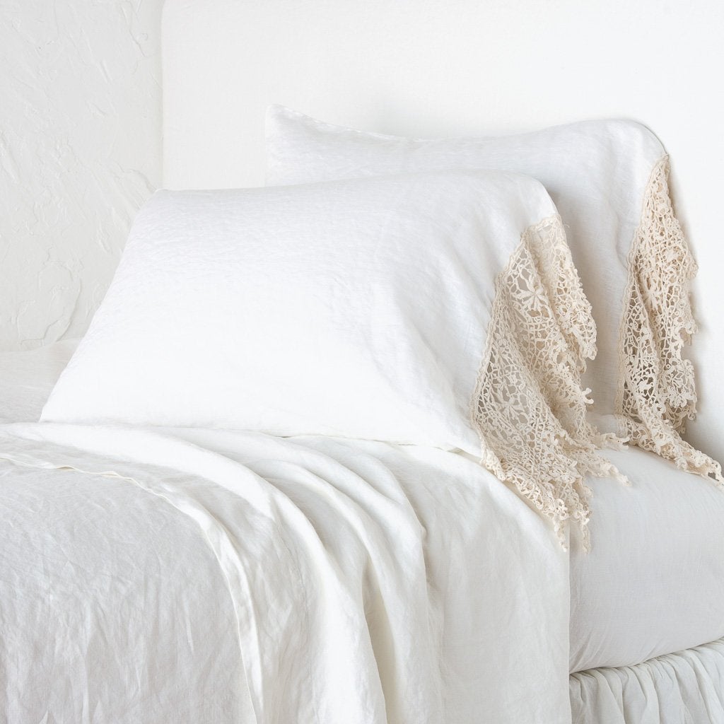 King-size linen pillowcase with Frida lace detail by Bella Notte, featuring soft, textured fabric and elegant lace accents.