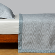 Bella Notte Cirillo coverlet in autumn colors, showcasing soft, luxurious fabric and elegant design for king-sized bedding.