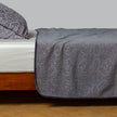 Bella Notte Vienna coverlet in autumn colors, showing a cozy, textured fabric on a king-sized bed.