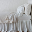 Bella Notte Vienna coverlet in autumn color, showcasing a soft, textured fabric on a neatly made bed.