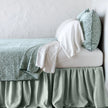 Bella Notte Vienna coverlet in autumn color, showcasing soft fabric and elegant design on a bed.