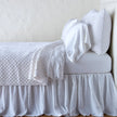 Bella Notte silk velvet quilted coverlet in warm autumn tones, lightweight and luxuriously soft twin-sized bedding.