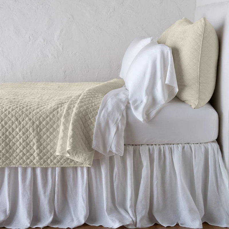 Bella Notte silk velvet quilted coverlet in autumn tones, twin size with a plush, luxurious quilted texture.