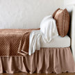Bella Notte silk velvet quilted coverlet in autumn tones, twin size, featuring a luxurious, soft velvet and intricate quilted pattern.