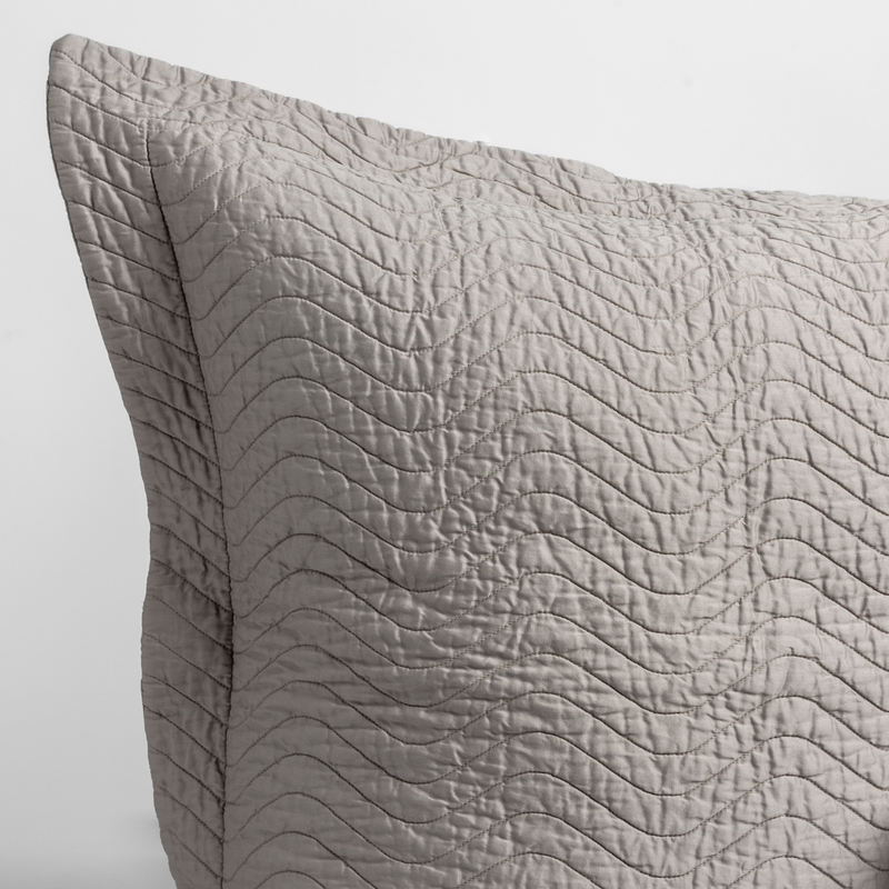 Bella Notte Cirillo Sham Deluxe in autumn-colored fabric, featuring elegant stitching and luxurious textile details.