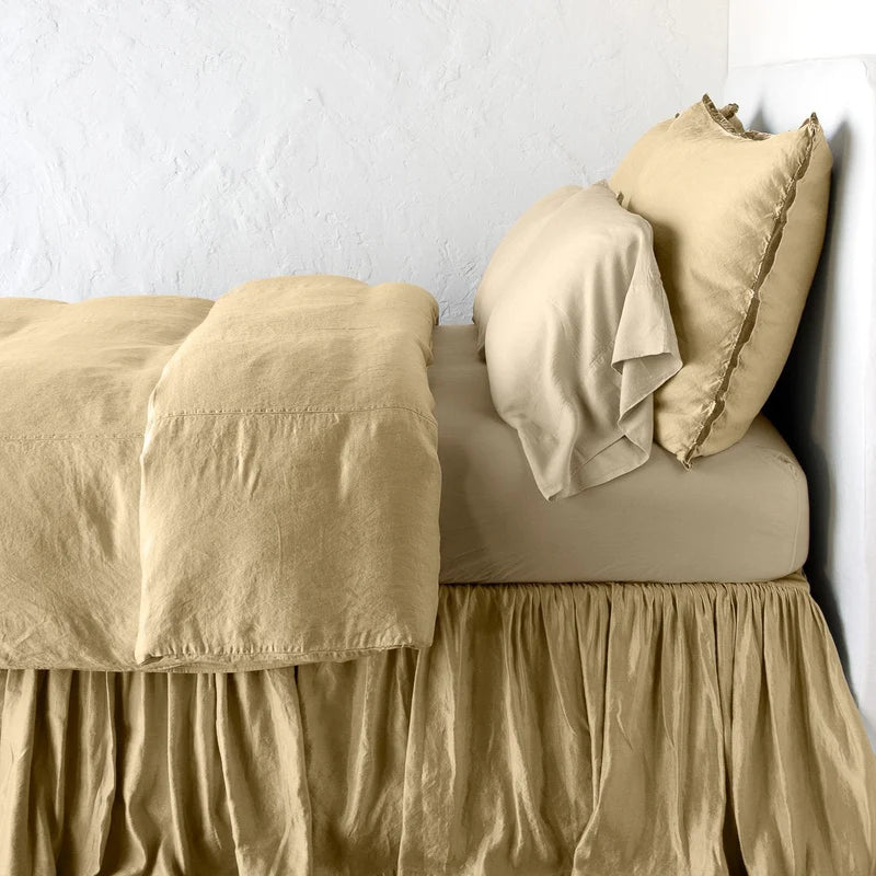 Bella Notte Paloma duvet cover in autumn color, showing soft fabric and elegant design on a king bed.