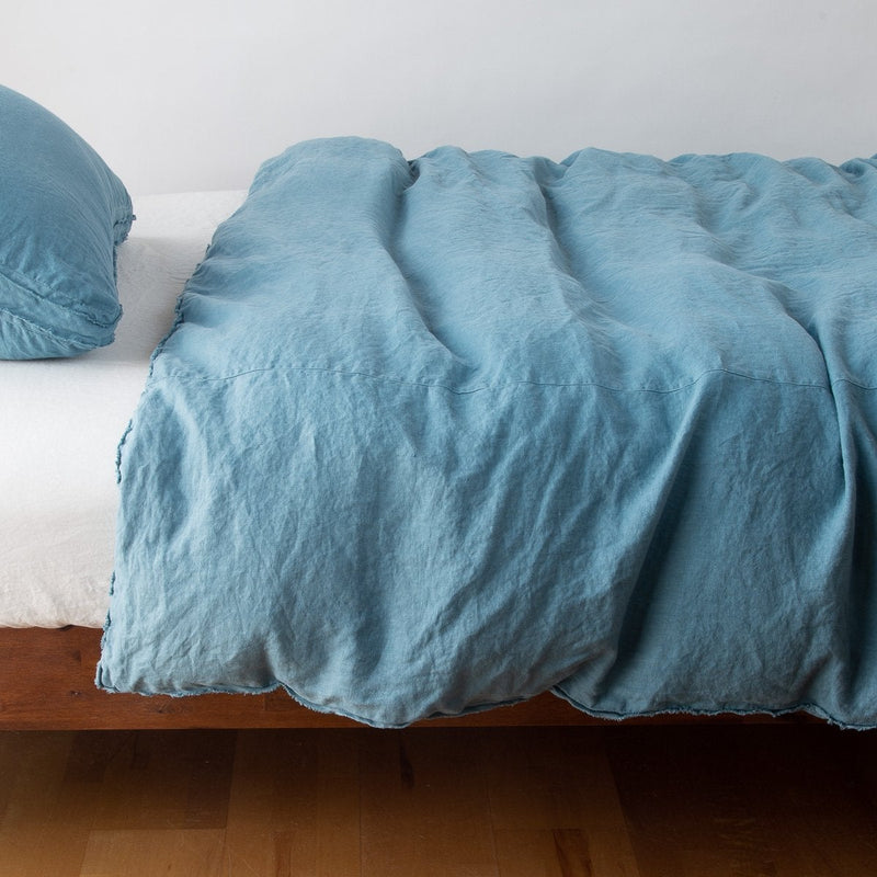 Bella Notte Austin Duvet Cover in Cenote fabric, king size, showcasing soft, luxurious bedding with intricate details.