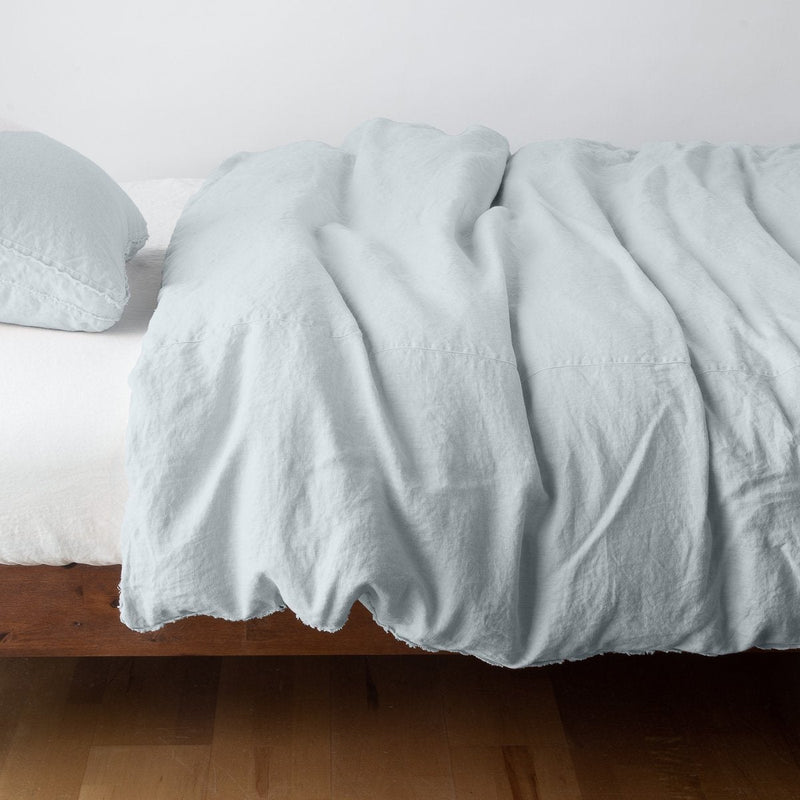 Bella Notte Austin duvet cover in Cenote fabric, king size, showcasing soft, luxurious bedding with intricate stitching details.
