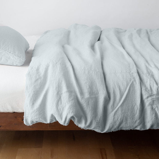 Bella Notte Austin duvet cover in Cenote fabric, king size, showcasing soft, luxurious bedding with intricate stitching details.