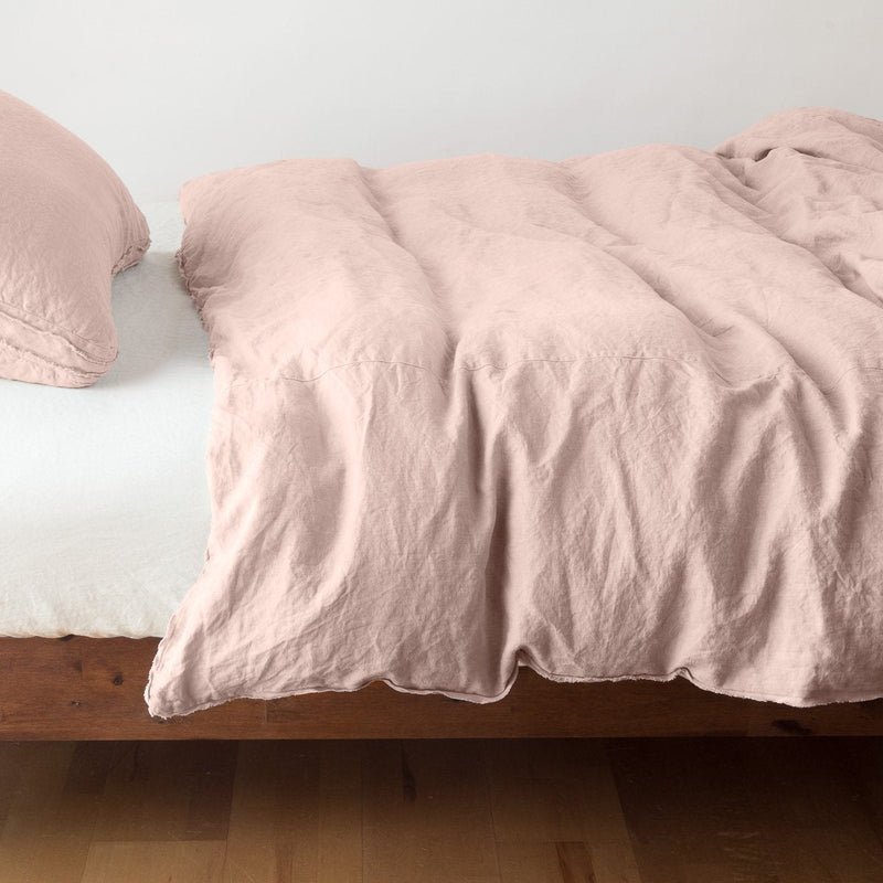 Bella Notte Austin duvet cover in Cenote fabric, shown on a bed with soft, luxurious bedding and elegant design.