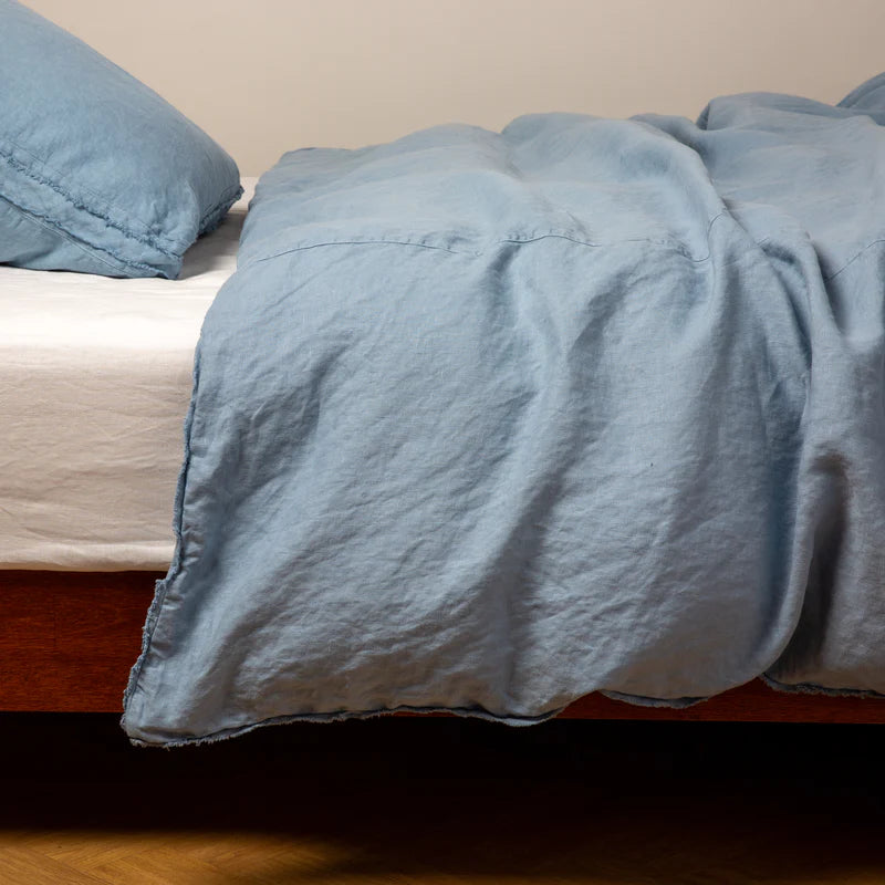 Bella Notte Austin duvet cover in Cenote fabric, showcasing elegant textile pattern on a king-sized bed.