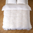 Bella Notte Lynette Luxe Duvet Cover in soft cloud color, showcasing elegant fabric and detailed stitching for king size bed.