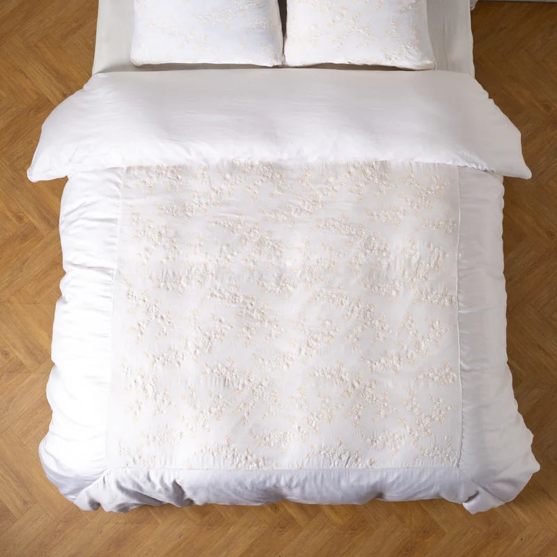 Bella Notte Lynette Luxe Duvet Cover in soft cloud color, showcasing elegant fabric and detailed stitching for king size bed.