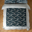 Luxurious Bella Notte Lynette Luxe Duvet Cover in cloud color, king size, showcasing soft fabric and elegant design.