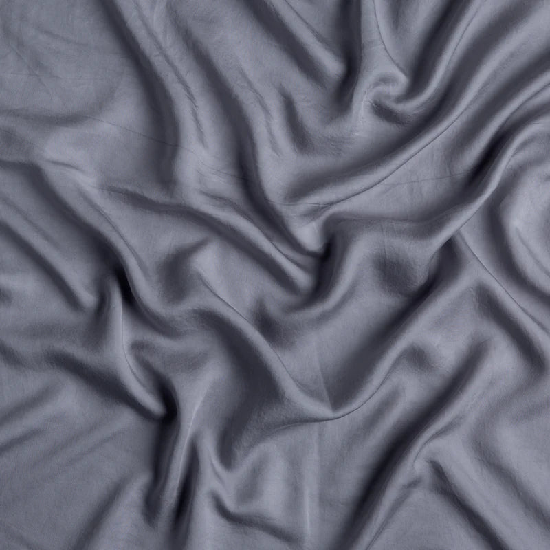 Bella Notte Madera Luxe duvet cover in cloud color, king size, showing soft fabric with elegant texture and stitching details.