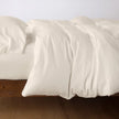 Bella Notte Madera Luxe duvet cover in cloud color, showcasing soft, luxurious fabric and elegant design for king size bedding.