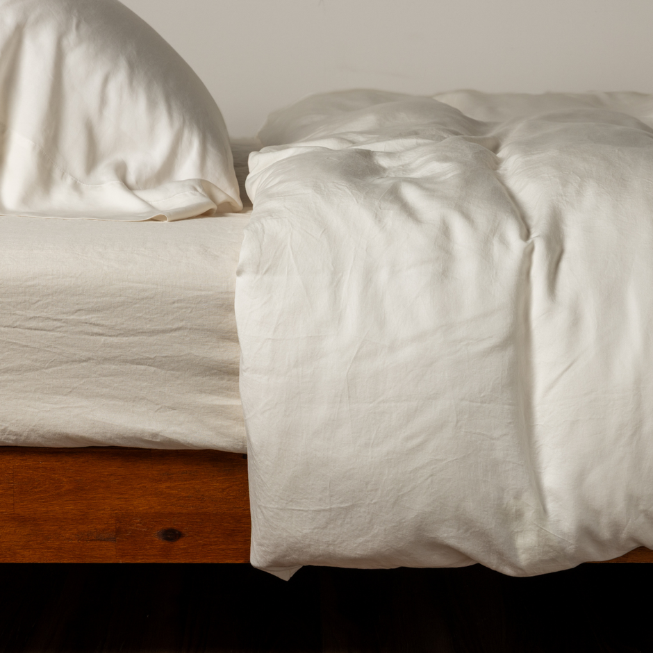 Natural-colored Bella Notte Madera Luxe duvet cover made of soft fabric, showcasing elegant, textured bedding design.