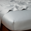 Bella Notte Bria Fitted Sheet in Cenote, California King size, showcasing soft, luxurious fabric and secure fitted design.