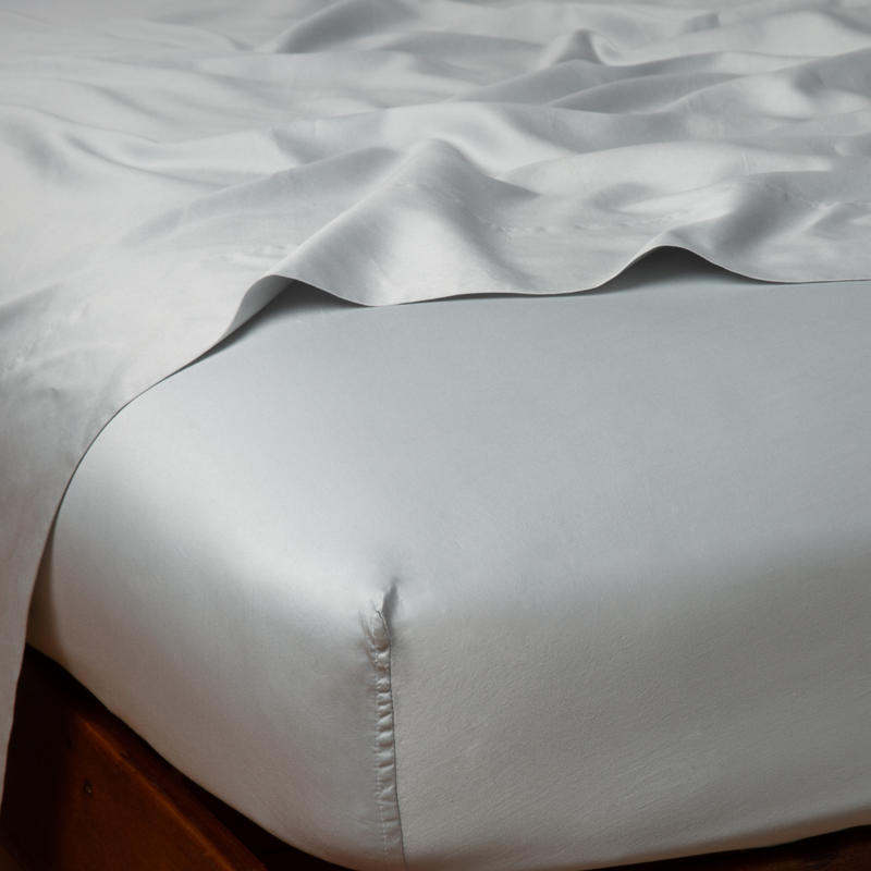 Cal King Bella Notte Bria Fitted Sheet in Cenote fabric showing the soft, fitted sheet with elastic edges for a snug fit.